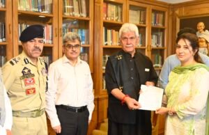 Lieutenant Governor hands-over appointment letter to wife of Martyr J&K Police Inspector Masroor Ali Wani