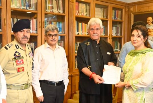 Lieutenant Governor hands-over appointment letter to wife of Martyr J&K Police Inspector Masroor Ali Wani